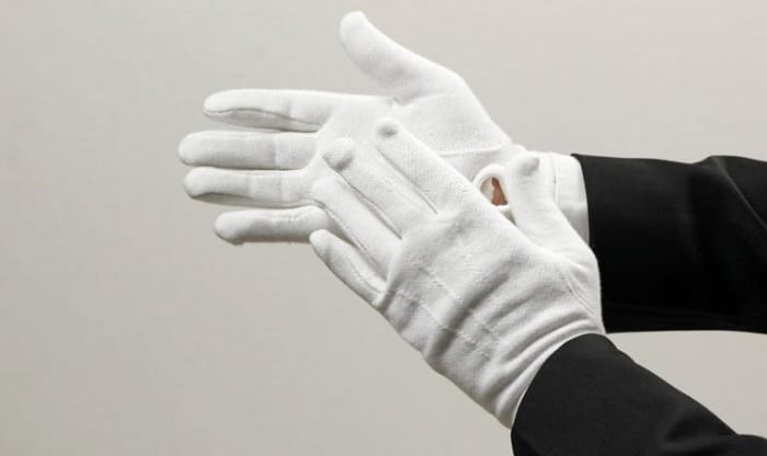 what do white gloves represent